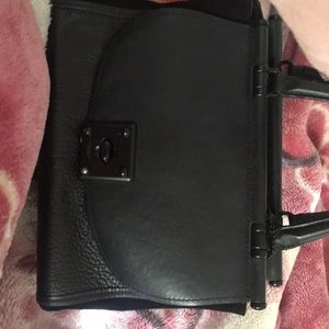 Used black leather coach bag
